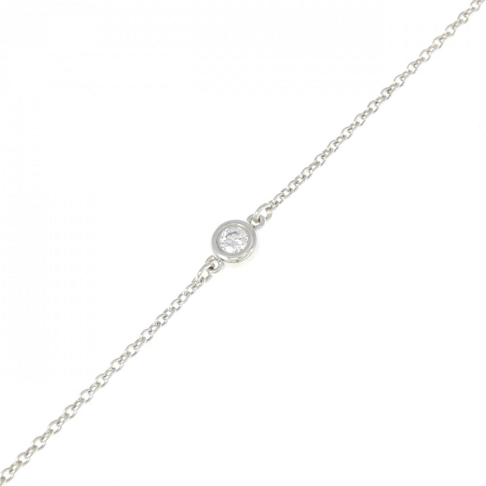 Tiffany Silver 925 Charm Bracelet: Tiffany Silver 925 Charm Bracelet Tiffany Silver 925 Charm Bracelet for women, 18.5 cm (7.28 inches) in length, featuring a diamond, in used condition but like new with minimal traces of usage. Item