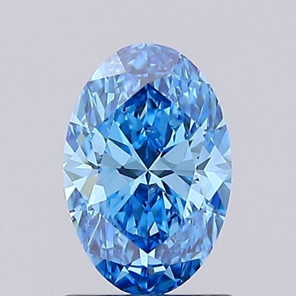 Loose Lab Diamond 1.01ct IGI Oval Fancy Vivid Blue VS1: Loose Lab Diamond 1.01ct IGI Oval Fancy Vivid Blue VS1 This 1.01ct oval loose lab diamond features a fancy vivid blue color and VS1 clarity, certified by IGI, with measurements of 8.26L x 5.52W x