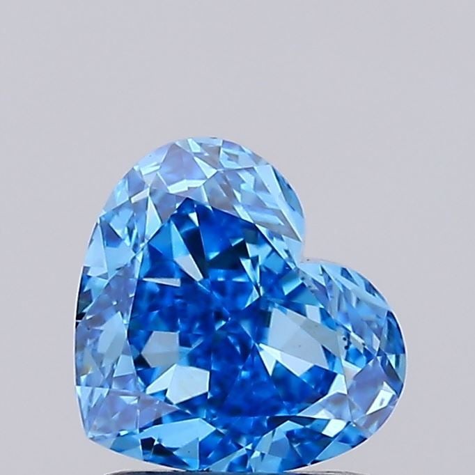 Loose Lab Diamond IGI Heart 1.27ct Fancy Vivid Blue VS2: Loose Lab Diamond IGI Heart 1.27ct Fancy Vivid Blue VS2 Loose lab-grown diamond, 1.27ct, fancy vivid blue color, clarity VS2, excellent polish and symmetry, measures 6.4L x 7.24W x 3.77H mm,