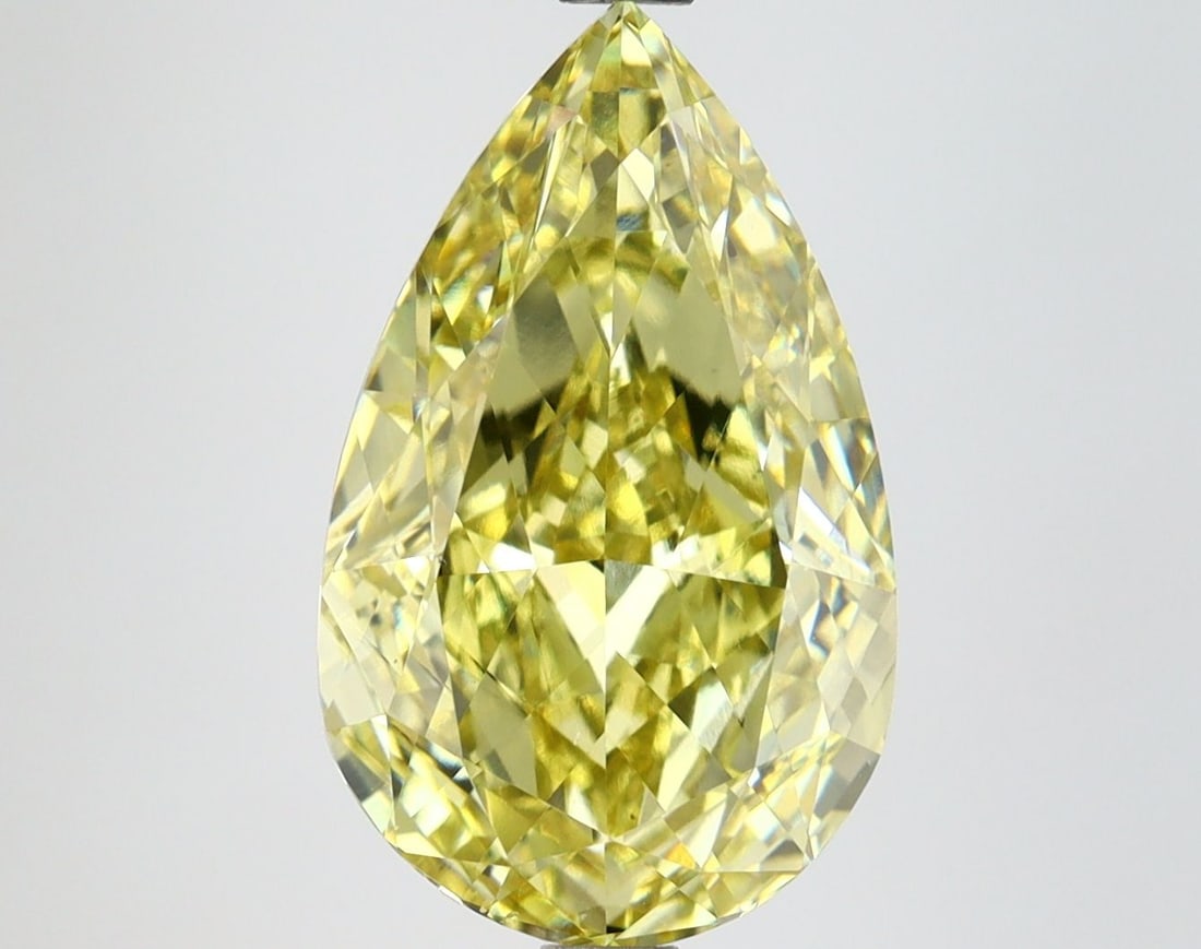 Loose Lab Diamond IGI Pear 4.77ct Fancy Intense Yellow VS2: Loose Lab Diamond IGI Pear 4.77ct Fancy Intense Yellow VS2 Loose lab-grown diamond with a carat weight of 4.77, featuring a fancy intense yellow color and VS2 clarity, certified by IGI, with