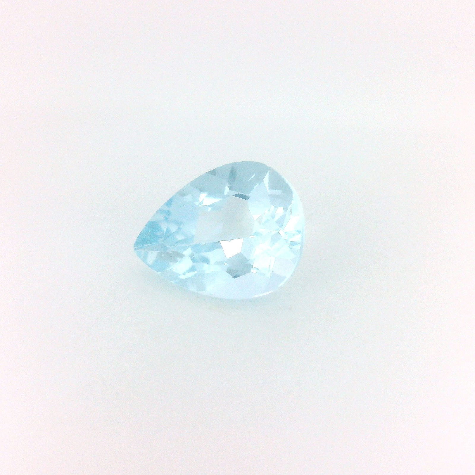 GSI Loose Aquamarine Gemstone 1.46ct Pear Blue EC: GSI Loose Aquamarine Gemstone 1.46ct Pear Blue EC The GSI certified Loose Aquamarine Gemstone weighs 1.46ct, features a Pear cut, and exhibits a Light Blue color with measurements of 9.16L x 7.09W. 