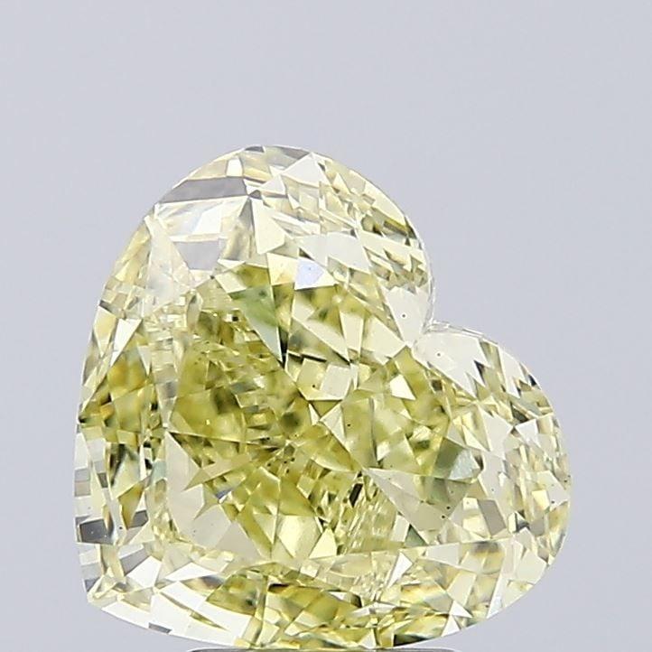 Loose Lab Diamond 4.25ct Heart Fancy Intense Yellow VS1: Loose Lab Diamond 4.25ct Heart Fancy Intense Yellow VS1 A Loose Lab Diamond weighing 4.25ct with a Heart cut, Fancy Intense Yellow color, VS1 clarity, measuring 9.87L x 10.86W x 5.3H and is not