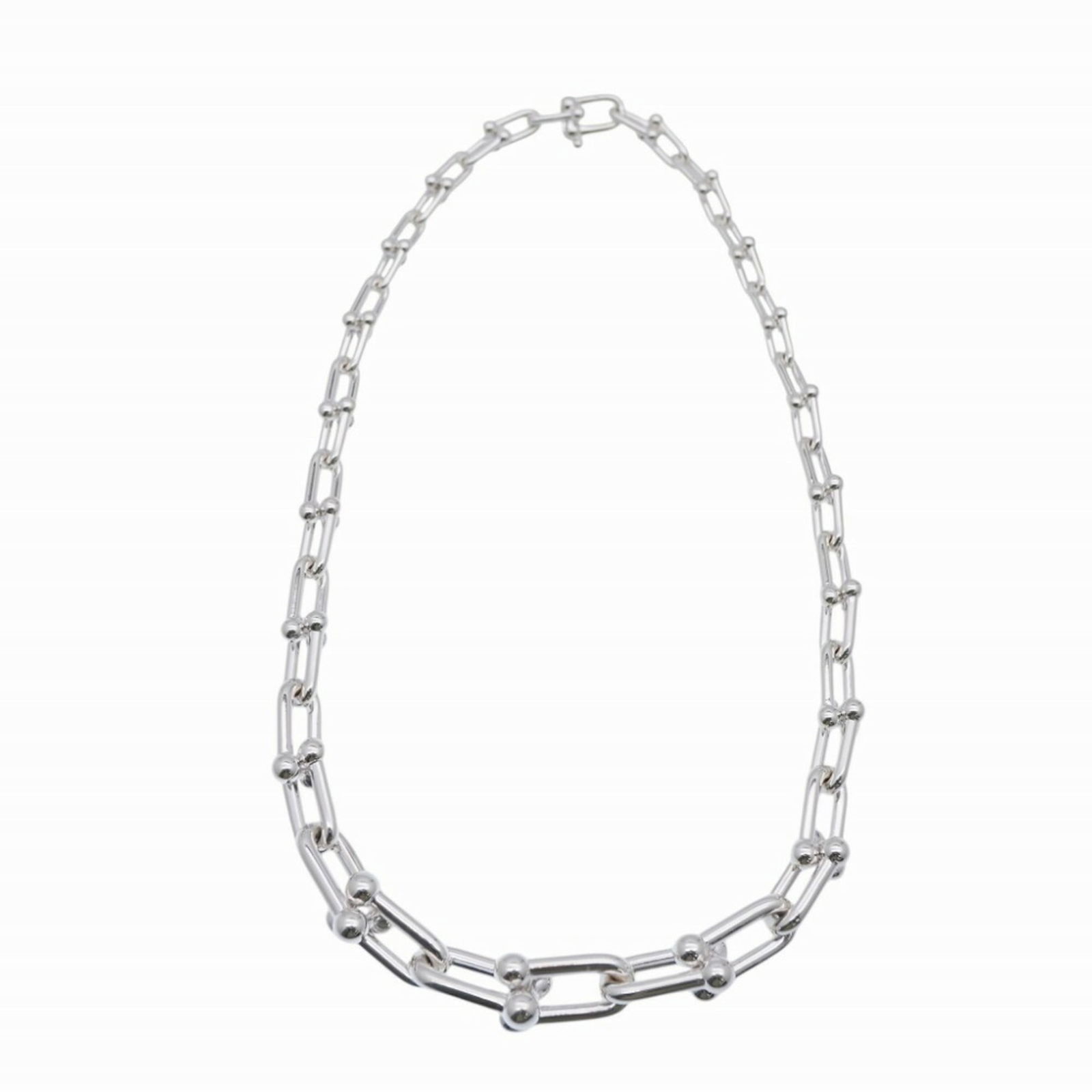 Silver 925 Tiffany: Silver 925 Tiffany Tiffany Silver 925 necklace, suitable for both men and women, features a silver color with a neck circumference of 45 cm (17.71 inches). It is in like new condition with negligible
