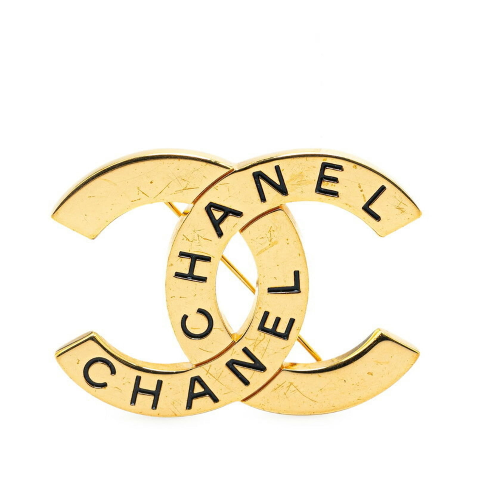 Plating Chanel Brooch Gold: Plating Chanel Brooch Gold Vintage Chanel gold-plated brooch for women, measuring 34.3 cm x 45 cm (13.5'' x 17.71''). The used item is in good condition with some traces of usage. Item Specifics: