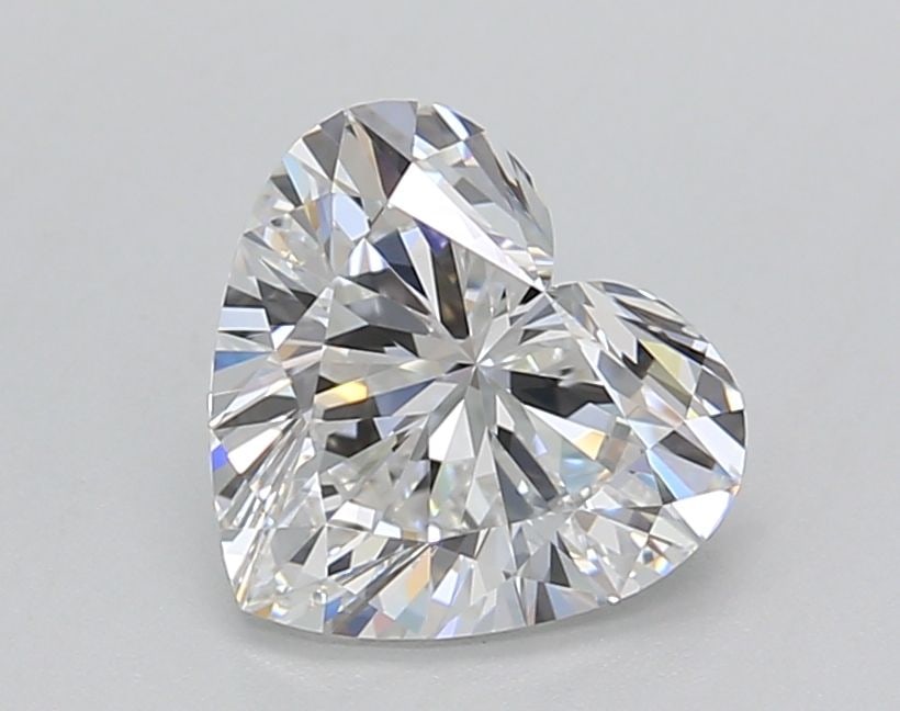 Loose Lab Diamond GIA Heart 1.51ct E VVS1: Loose Lab Diamond GIA Heart 1.51ct E VVS1 Loose lab-grown diamond shaped as a heart, weighing 1.51 carats, color E, clarity VVS1, with GIA certification. Features excellent polish and symmetry. Item