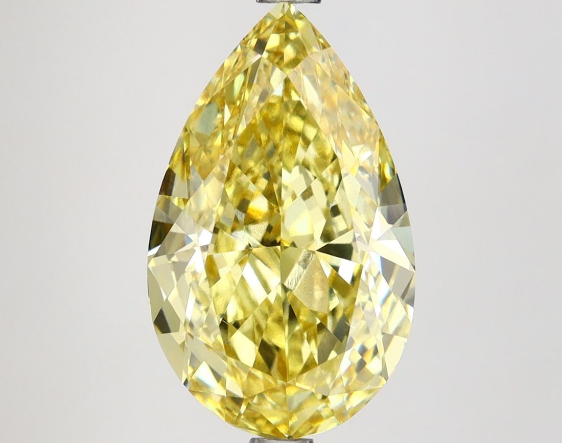 Loose Lab Diamond IGI Pear 4.81ct Fancy Intense Yellow VS1: Loose Lab Diamond IGI Pear 4.81ct Fancy Intense Yellow VS1 Loose lab-grown diamond in a pear shape, weighing 4.81 carats, color fancy intense yellow, clarity VS1, with IGI certification and excellent