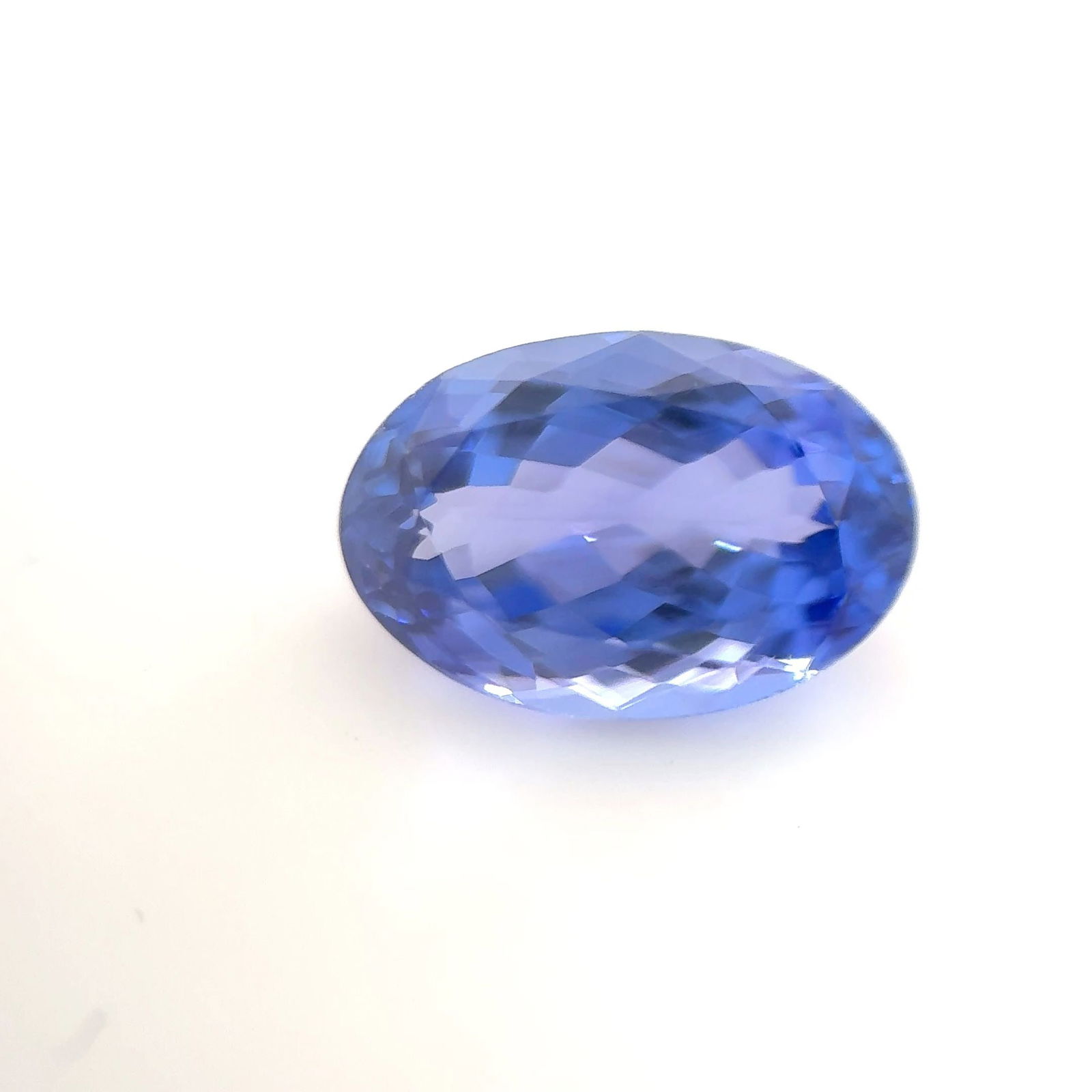 Loose Tanzanite Gemstone Oval 1.55ct Blue EC: Loose Tanzanite Gemstone Oval 1.55ct Blue EC Loose tanzanite gemstone weighing 1.55 carats, blue color, with a faceted cut and treated for enhanced color. No certification available. Item Specifics: