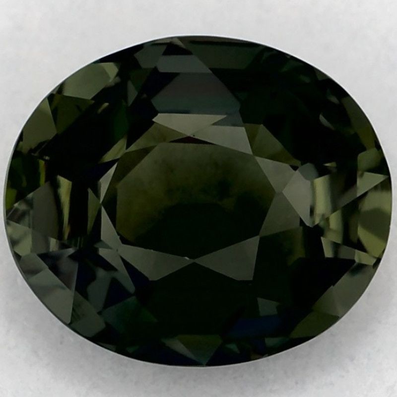 Loose Sapphire Gemstone 1.12ct Green EC - Oval: Loose Sapphire Gemstone 1.12ct Green EC - Oval Loose Sapphire Gemstone weighing 1.12ct, faceted in green with EC clarity, heated treatment, and measuring 6.86L x 5.88W. Item Specifics: Type: