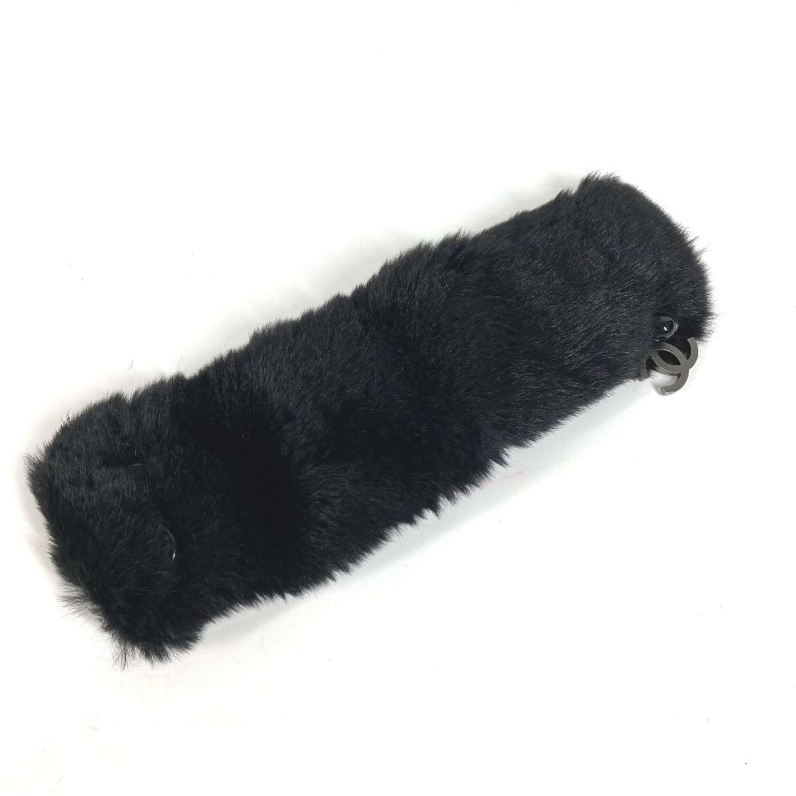 Fur Chanel Bangle: Fur Chanel Bangle This Chanel bangle is made of black fur, measures 85cm in width, and is in good used condition with some signs of wear. Item Specifics: Brand: Chanel Type: Bangle Gender: Women