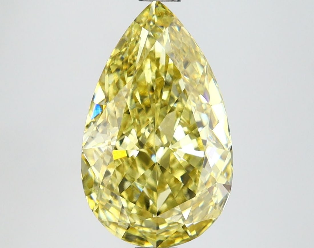 Loose Lab Diamond IGI Pear 2.84ct Fancy Intense Yellow VVS2: Loose Lab Diamond IGI Pear 2.84ct Fancy Intense Yellow VVS2 This is a 2.84ct loose lab-grown diamond with a pear shape, color Fancy Intense Yellow, and clarity VVS2, certified by IGI. Item