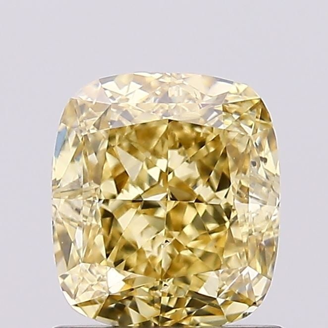 1.13ct Fancy Intense Yellow VS2 IGI Cushion Modified - Loose Lab Diamond: 1.13ct Fancy Intense Yellow VS2 IGI Cushion Modified - Loose Lab Diamond Loose Lab Diamond weighing 1.13ct with fancy intense yellow color, VS2 clarity, excellent polish and symmetry, certified by