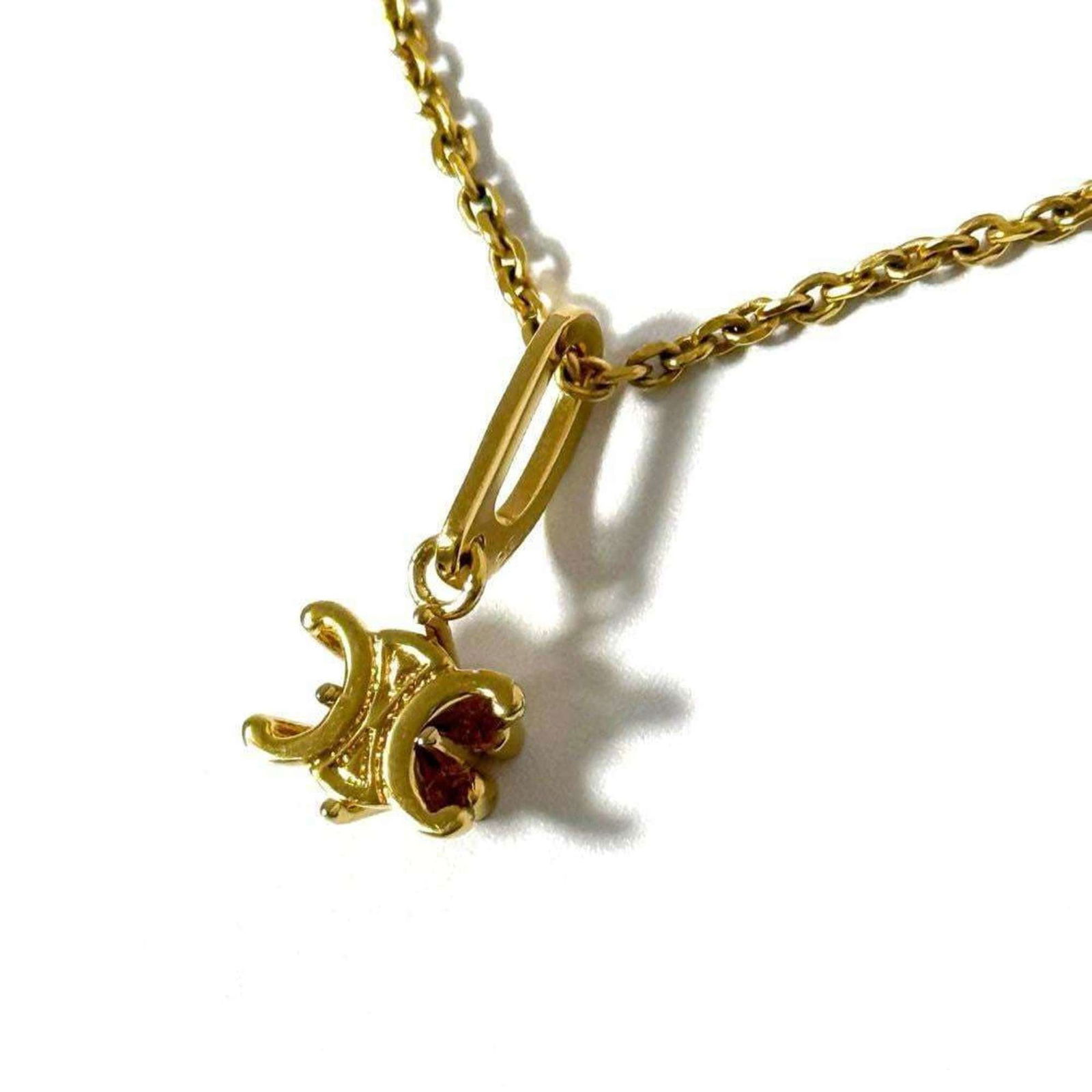 Metal Celine: Metal Celine Celine metal necklace for women, designed as a pendant with a neck circumference adjustable between 36cm and 40cm, in very good used condition. Item Specifics: Brand: Celine Necklace Type