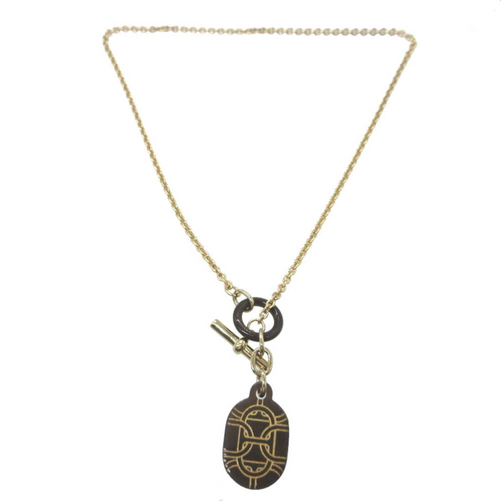 Metal Hermes: Metal Hermes This Hermes necklace, made of metal, features a brown and gold color scheme with a neck circumference of 41cm, and is in very good used condition. Item Specifics: Brand: Hermes Necklace T