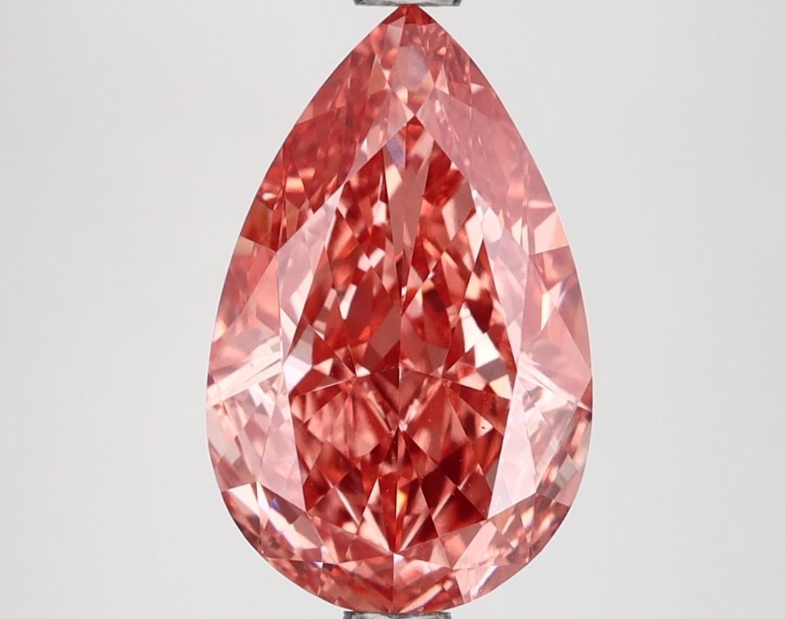 Loose Lab Diamond 2.92ct Pear Fancy Vivid Pink VS1: Loose Lab Diamond 2.92ct Pear Fancy Vivid Pink VS1 Loose lab-grown diamond, 2.92ct pear cut, fancy vivid pink color with VS1 clarity, measuring 12.0L x 7.52W x 4.49H, certified by IGI. Item