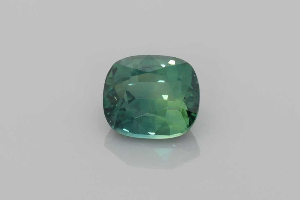 Loose Sapphire Gemstone GIA Cushion 2.05ct Teal EC: Loose Sapphire Gemstone GIA Cushion 2.05ct Teal EC Loose 2.05 carat teal sapphire gemstone, faceted with EC clarity, heated treatment, GIA certified, and vivid color shade. Item Specifics: Type: