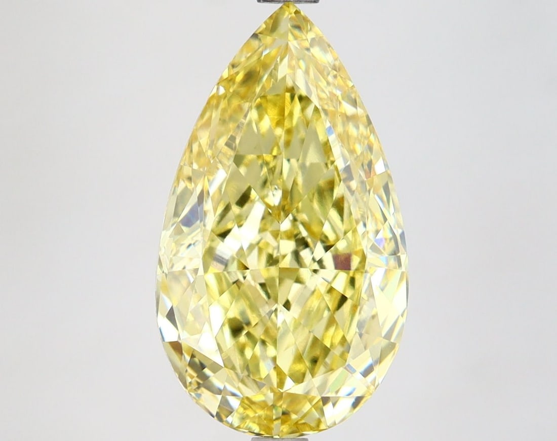 Loose Lab Diamond IGI Pear 4.72ct Fancy Vivid Yellow VS1: Loose Lab Diamond IGI Pear 4.72ct Fancy Vivid Yellow VS1 Loose Lab Diamond IGI Pear 4.72ct Fancy Vivid Yellow VS1 with excellent polish and symmetry, measuring 14.7L X 8.49W X 5.22H, certified by