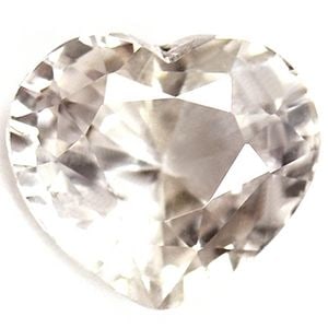 Loose Sapphire Gemstone Heart 1.49ct White SI: Loose Sapphire Gemstone Heart 1.49ct White SI Loose sapphire gemstone weighing 1.49ct, heart cut in white color with SI clarity, untreated, no certification, measuring 5.98L x 6.89W. Item Specifics: