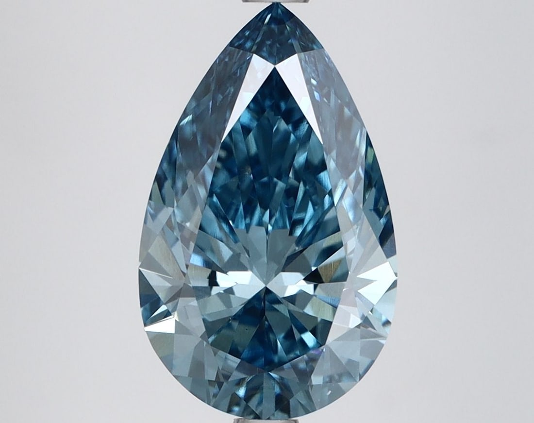 Loose Lab Diamond IGI Pear 2.97ct Fancy Vivid Blue VS1: Loose Lab Diamond IGI Pear 2.97ct Fancy Vivid Blue VS1 Loose lab-grown diamond weighing 2.97 carats, pear cut with fancy vivid blue color and VS1 clarity, certified by IGI, measuring 12.96L x 7.98W x