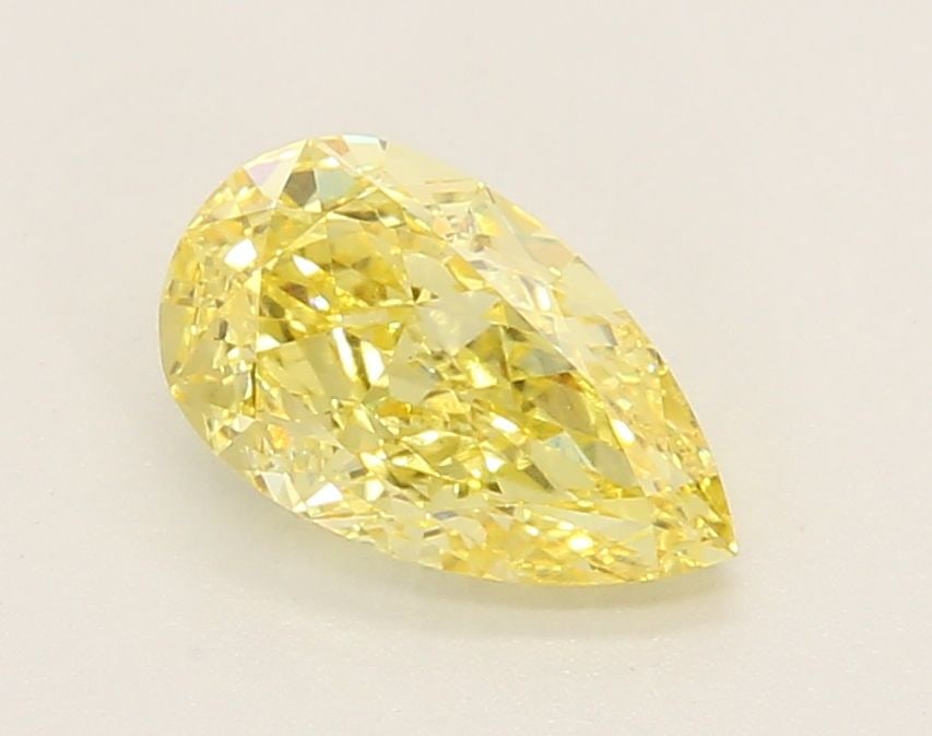 Loose Lab Diamond IGI Pear 1.29ct Fancy Vivid Yellow VS1: Loose Lab Diamond IGI Pear 1.29ct Fancy Vivid Yellow VS1 Loose lab-grown diamond, 1.29ct, Fancy Vivid Yellow color, VS1 clarity, with IGI certification. Item Specifics: Source: This Is A Real