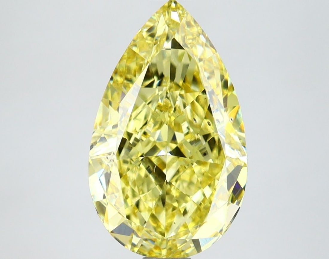 Loose 3.01ct IGI Pear Fancy Intense Yellow SI1 Lab Diamond: Loose 3.01ct IGI Pear Fancy Intense Yellow SI1 Lab Diamond The 3.07ct Ideal Loose Lab Diamond is round cut with E color and VVS2 clarity, certified by IGI with excellent polish and symmetry. Item