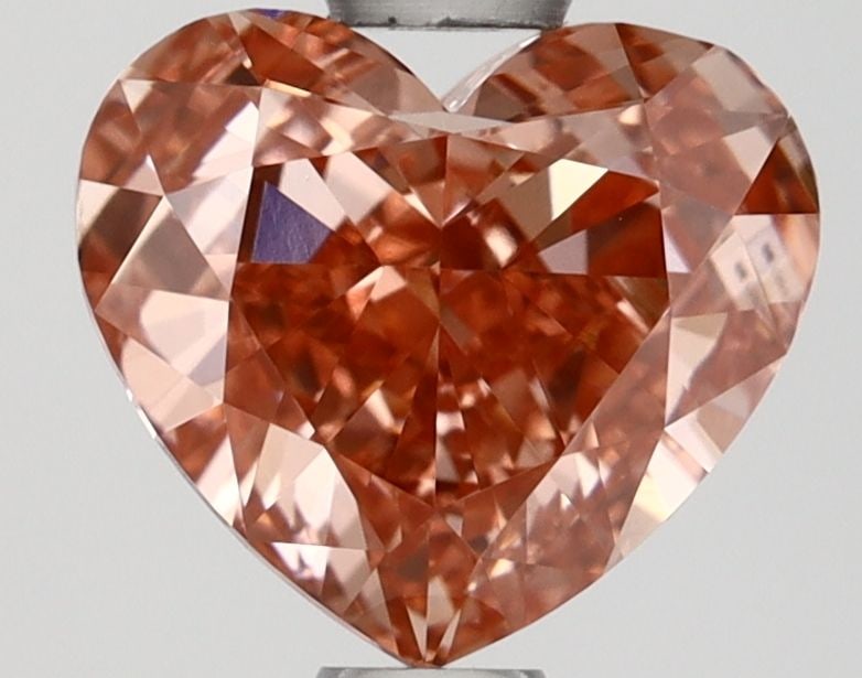 Loose Lab Diamond 1.05ct Fancy Vivid Brownish Pink VVS2 - IGI Heart: Loose Lab Diamond 1.05ct Fancy Vivid Brownish Pink VVS2 - IGI Heart Loose lab-grown diamond weighing 1.05ct with a Fancy Vivid Brownish Pink color, VVS2 clarity, and IGI certification. Measurements ar