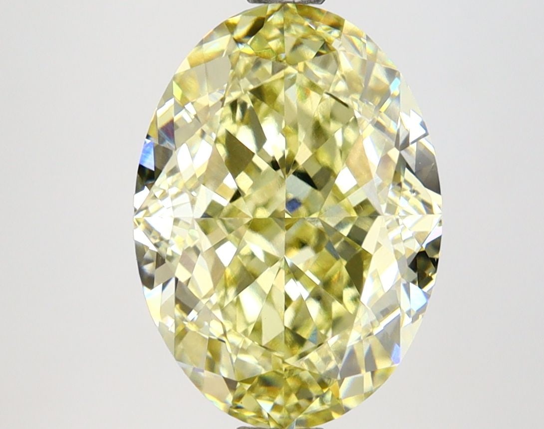 Loose Lab Diamond 4.63ct Fancy Yellow VVS1 - IGI Oval: Loose Lab Diamond 4.63ct Fancy Yellow VVS1 - IGI Oval Loose Lab Diamond 4.63ct, Fancy Yellow color, VVS1 clarity, featuring good polish and symmetry. IGI certified, measuring 11.69L x 8.4W x 5.82H. It