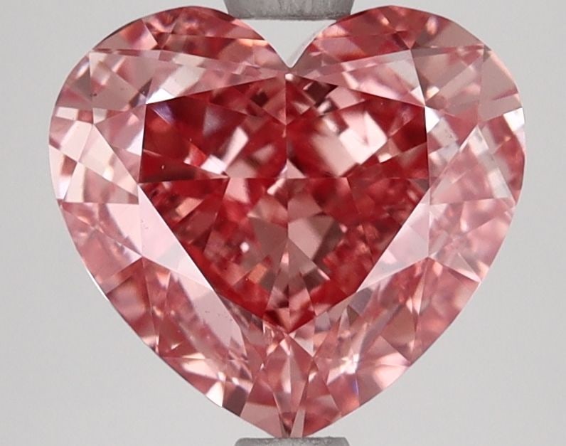 Loose Lab Diamond IGI Heart 3.03ct Fancy Vivid Pink VS1: Loose Lab Diamond IGI Heart 3.03ct Fancy Vivid Pink VS1 Loose Lab Diamond weighing 3.03ct, heart shaped with Fancy Vivid Pink color and VS1 clarity, certified by IGI. Dimensions are 8.4L x 9.18W x 5.1