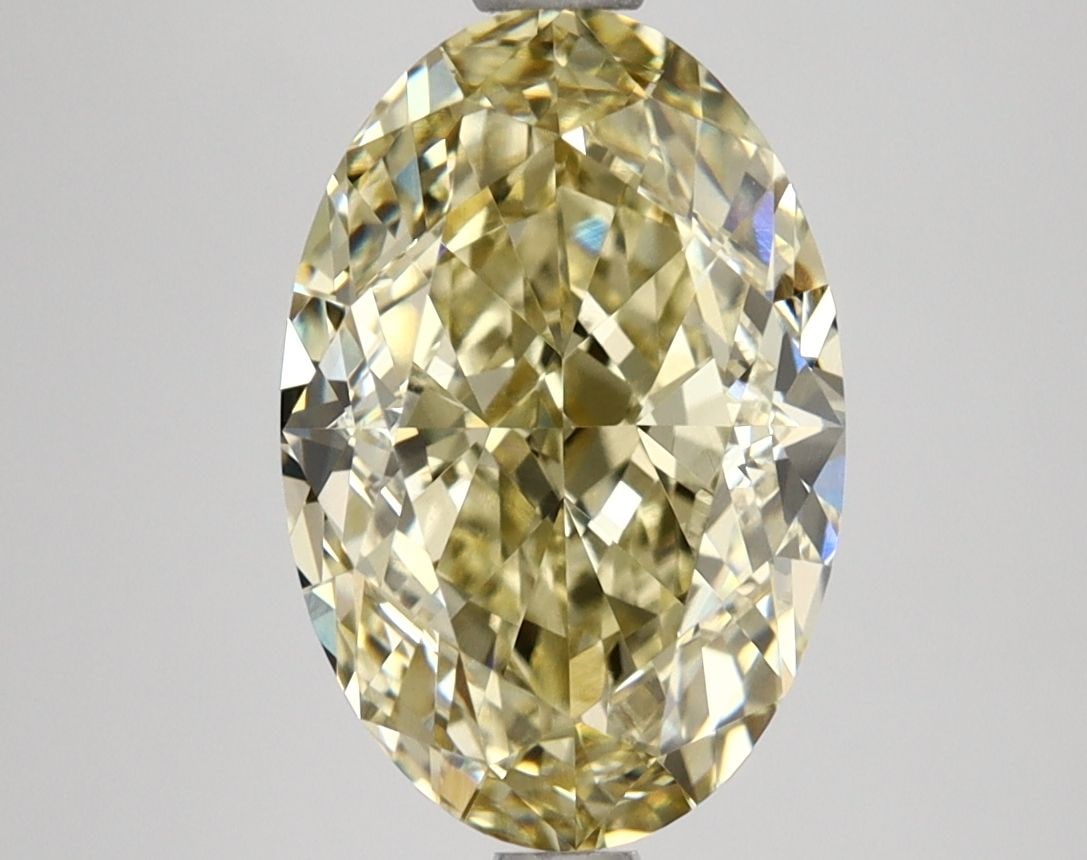 Loose Lab Diamond IGI Oval 3.78ct Fancy Yellow VVS2: Loose Lab Diamond IGI Oval 3.78ct Fancy Yellow VVS2 Loose Lab Diamond IGI Oval 3.78ct, color fancy yellow, clarity VVS2, with excellent polish and symmetry. Certified by IGI, it measures 11.63L x 7.76