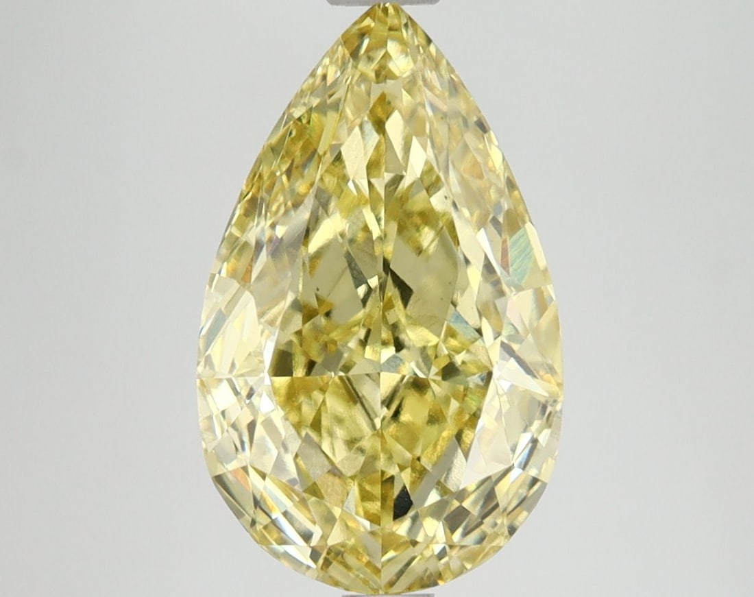 Loose Lab Diamond IGI Pear 3.3ct Fancy Vivid Yellow VS1: Loose Lab Diamond IGI Pear 3.3ct Fancy Vivid Yellow VS1 Loose Lab Diamond IGI Pear, 3.3ct, Fancy Vivid Yellow, VS1 clarity, with excellent polish and symmetry. Certified by IGI, measuring 13.07L x 8.0