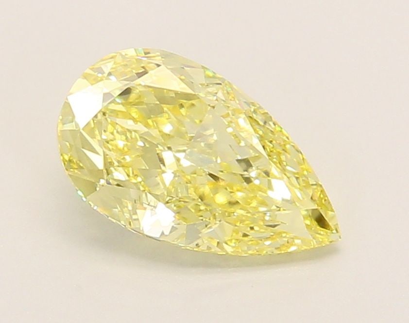 IGI 1.59ct Pear Fancy Yellow VVS2 - Loose Lab Diamond: IGI 1.59ct Pear Fancy Yellow VVS2 - Loose Lab Diamond The 1.59ct IGI certified loose lab diamond is a pear shape, with a fancy yellow color and VVS2 clarity, exhibiting excellent polish and good symme