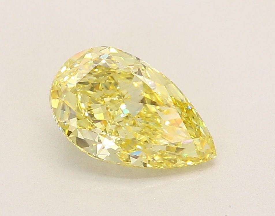 Loose Lab Diamond IGI Pear 1.65ct Fancy Intense Yellow VS1: Loose Lab Diamond IGI Pear 1.65ct Fancy Intense Yellow VS1 Loose lab-grown diamond IGI certified, 1.65ct, Fancy Intense Yellow color, VS1 clarity, with VG polish and symmetry, measuring 10.0 x 6.15 x