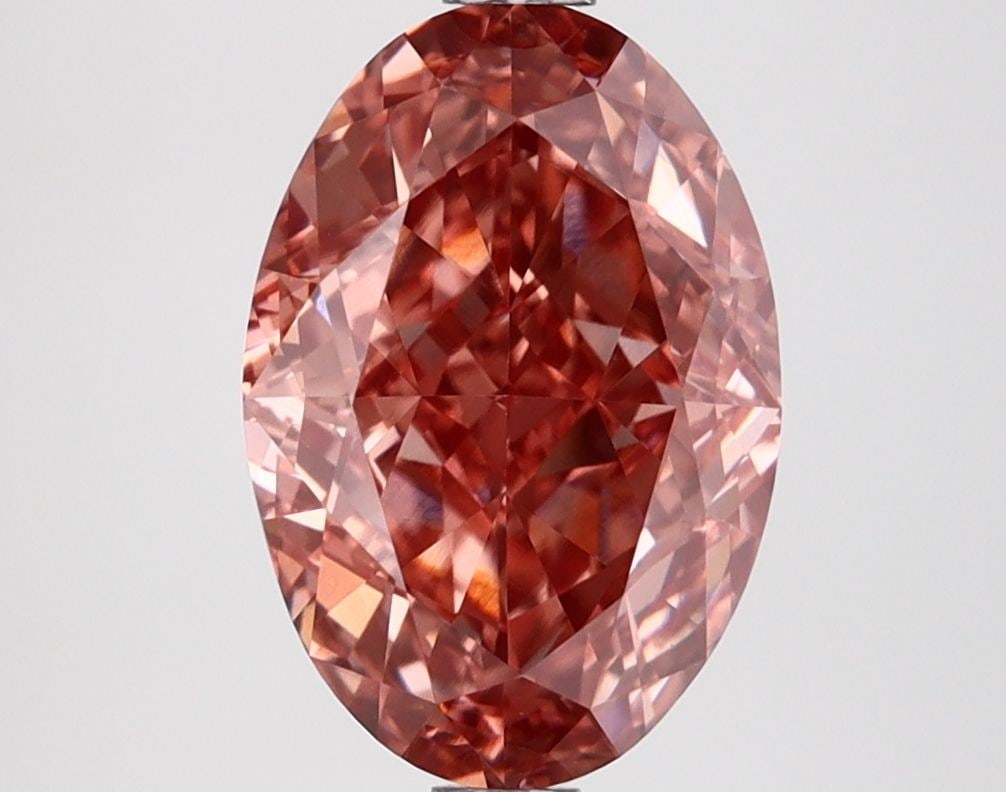 Loose Lab Diamond IGI Oval 3.28ct Fancy Vivid Brownish Pink VVS2: Loose Lab Diamond IGI Oval 3.28ct Fancy Vivid Brownish Pink VVS2 Loose Lab Diamond IGI Oval, 3.28ct, color Fancy Vivid Brownish Pink, clarity VVS2, with excellent polish and symmetry, measuring 10.89L