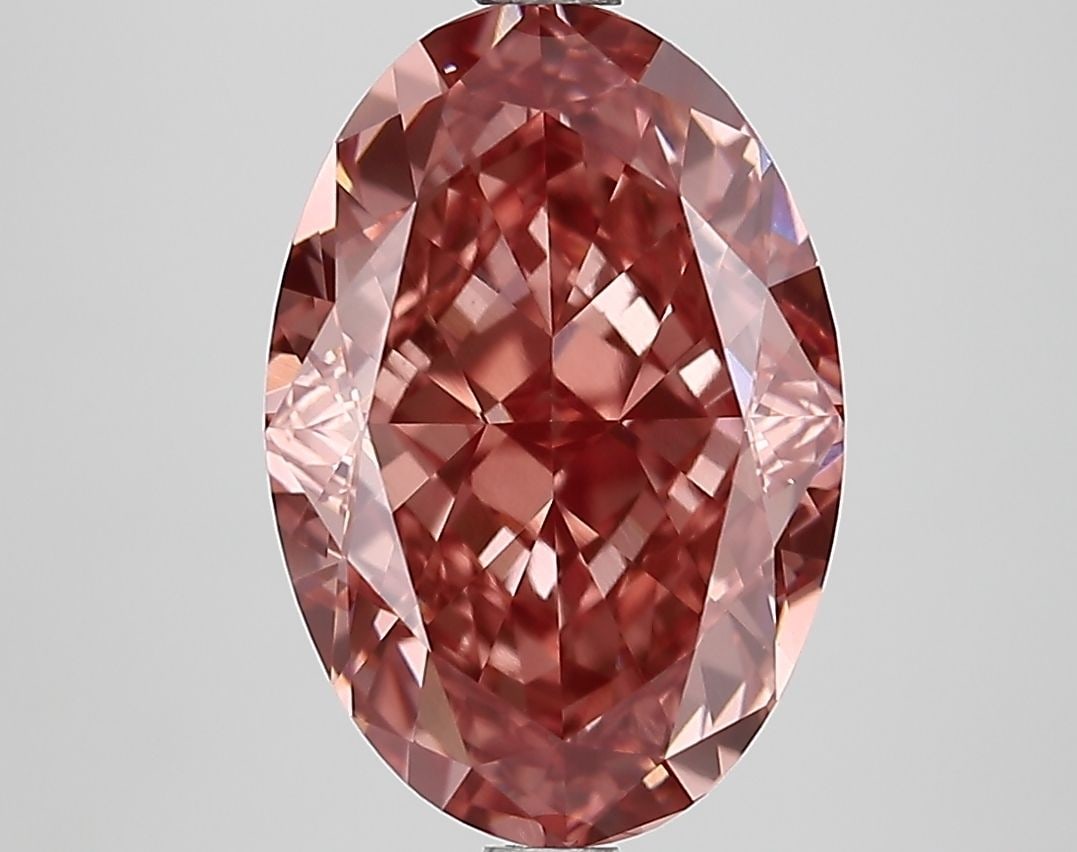 Loose Lab Diamond IGI Oval 4.6ct Fancy Vivid Brownish Pink VS1: Loose Lab Diamond IGI Oval 4.6ct Fancy Vivid Brownish Pink VS1 This 4.6ct loose lab-grown oval diamond showcases a Fancy Vivid Brownish Pink color and VS1 clarity, with excellent polish and symmetry,
