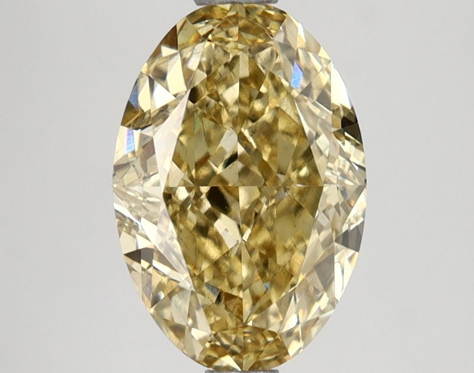 Loose Lab Diamond IGI Oval 2.57ct Fancy Intense Brownish Yellow VS2: Loose Lab Diamond IGI Oval 2.57ct Fancy Intense Brownish Yellow VS2 This 2.57ct loose lab-grown diamond is oval shaped with a fancy intense brownish yellow color and VS2 clarity, certified by IGI, mea