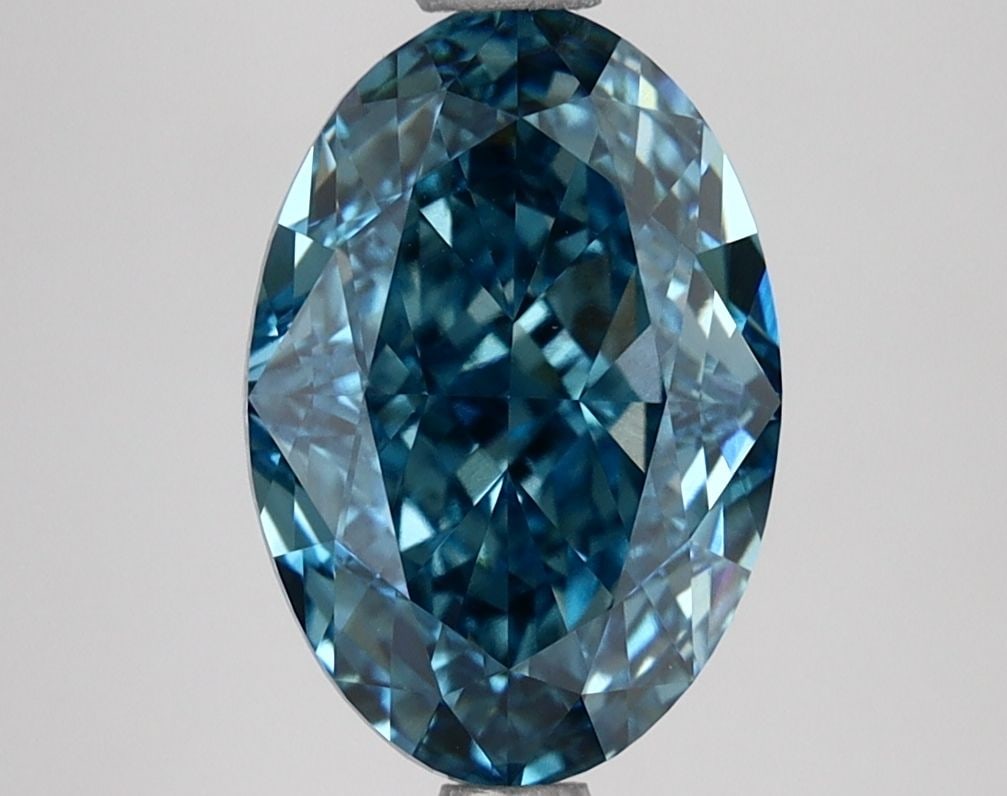 Loose Lab Diamond IGI Oval 3.06ct Fancy Vivid Blue VVS2: Loose Lab Diamond IGI Oval 3.06ct Fancy Vivid Blue VVS2 This 3.06ct loose lab-grown diamond is an oval cut, Fancy Vivid Blue, with VVS2 clarity and is certified by IGI. It has excellent polish and sym