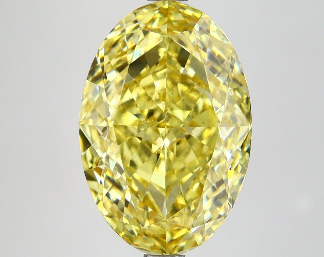 Oval 4.68ct Fancy Vivid Yellow VVS2 - Loose Lab Diamond IGI: Oval 4.68ct Fancy Vivid Yellow VVS2 - Loose Lab Diamond IGI Loose lab-grown oval diamond weighing 4.68ct, fancy vivid yellow color, clarity VVS2, IGI certification, with dimensions of 12.96L x 8.75W x