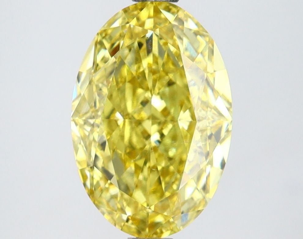 Loose Lab Diamond IGI Oval 2.59ct Fancy Vivid Yellow VS2: Loose Lab Diamond IGI Oval 2.59ct Fancy Vivid Yellow VS2 Loose Lab Diamond IGI Oval 2.59ct Fancy Vivid Yellow VS2, showcasing a lab-grown diamond with VS2 clarity and good polish, symmetry, certified
