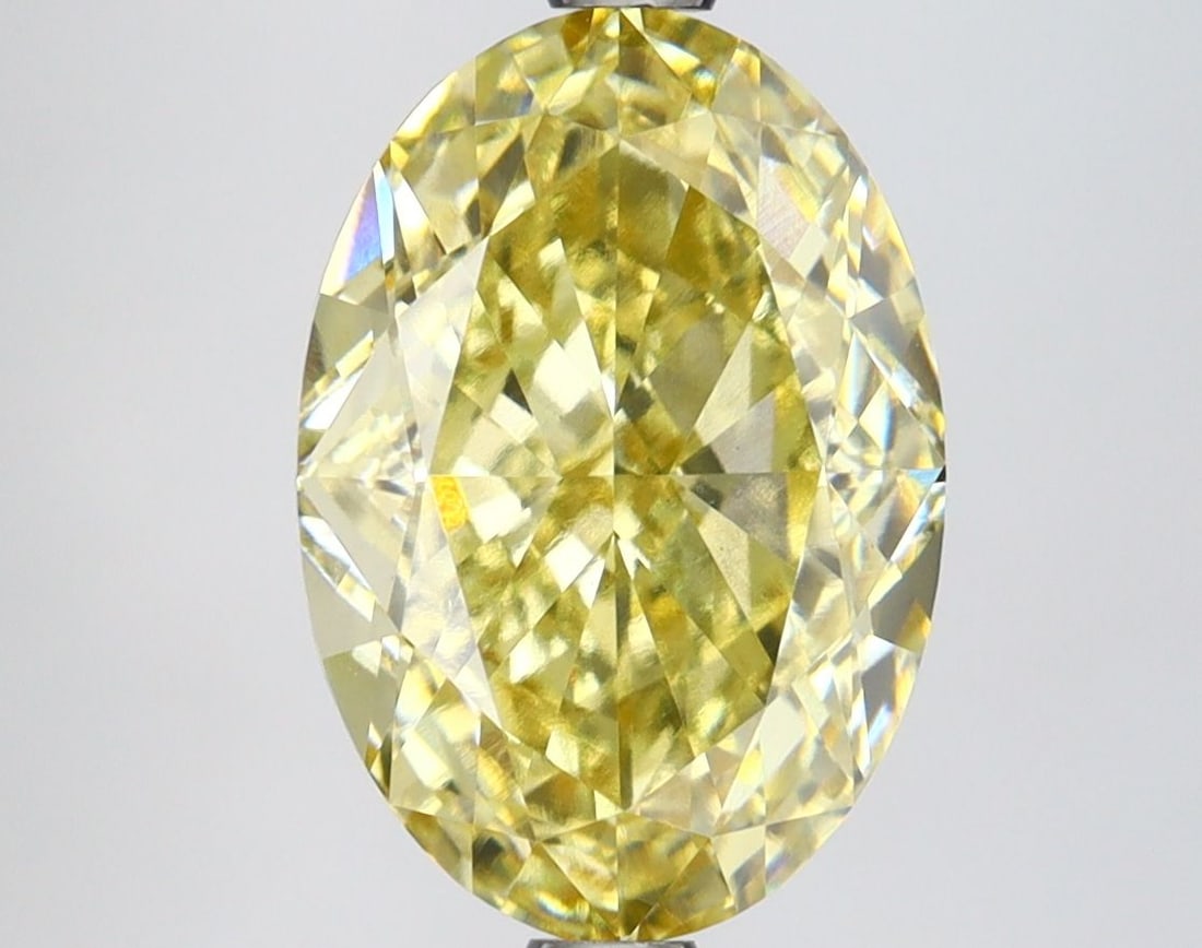 Loose Lab Diamond IGI Oval 4.14ct Fancy Yellow VS1: Loose Lab Diamond IGI Oval 4.14ct Fancy Yellow VS1 Loose lab diamond weighing 4.14ct, color Fancy Yellow, clarity VS1, certified by IGI. Features excellent polish and symmetry with measurements of 11.
