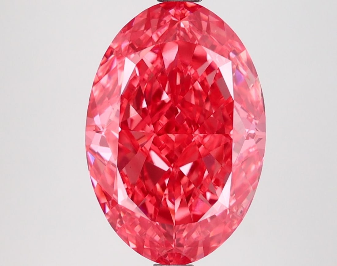 IGI Loose Lab Diamond 3.51ct Fancy Vivid Pink VS1 - Oval: IGI Loose Lab Diamond 3.51ct Fancy Vivid Pink VS1 - Oval IGI Loose Lab Diamond, 3.51ct Fancy Vivid Pink, Clarity: VS1, Good Polish and Symmetry, measures 12.36L x 8.37W x 4.64H, certified by IGI. Item