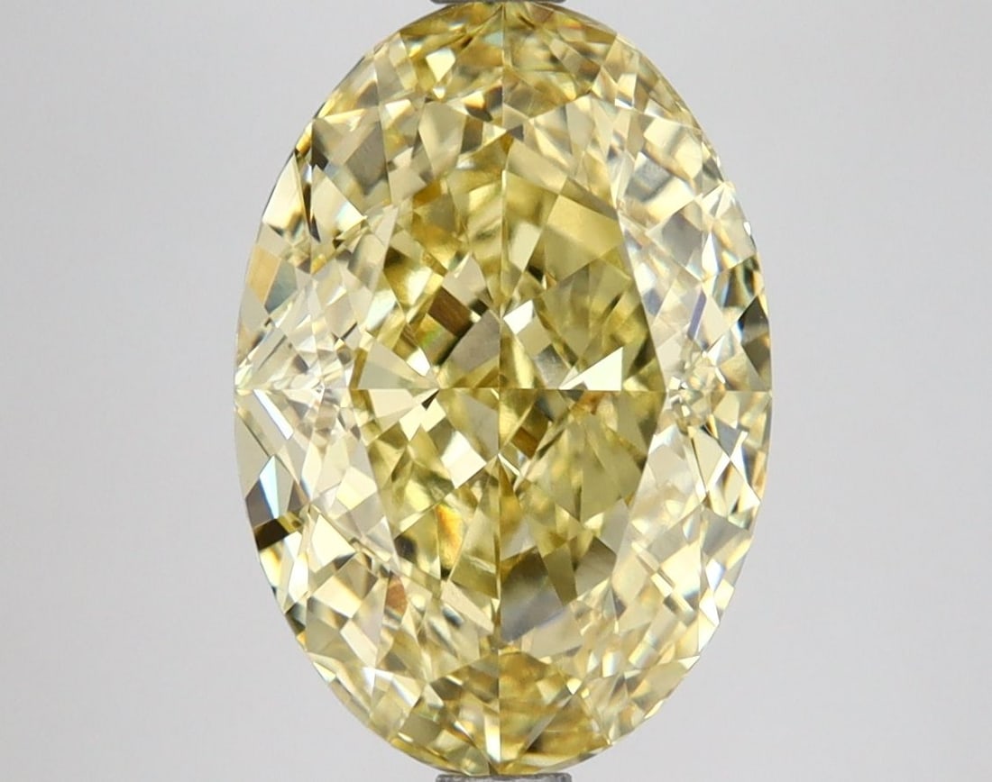 Loose Lab Diamond IGI Oval 4.23ct Fancy Vivid Yellow VS1: Loose Lab Diamond IGI Oval 4.23ct Fancy Vivid Yellow VS1 Loose Lab Diamond IGI Oval 4.23ct Fancy Vivid Yellow VS1, certified by IGI, with excellent polish and symmetry, measuring 12.22L x 8.42W x 5.33