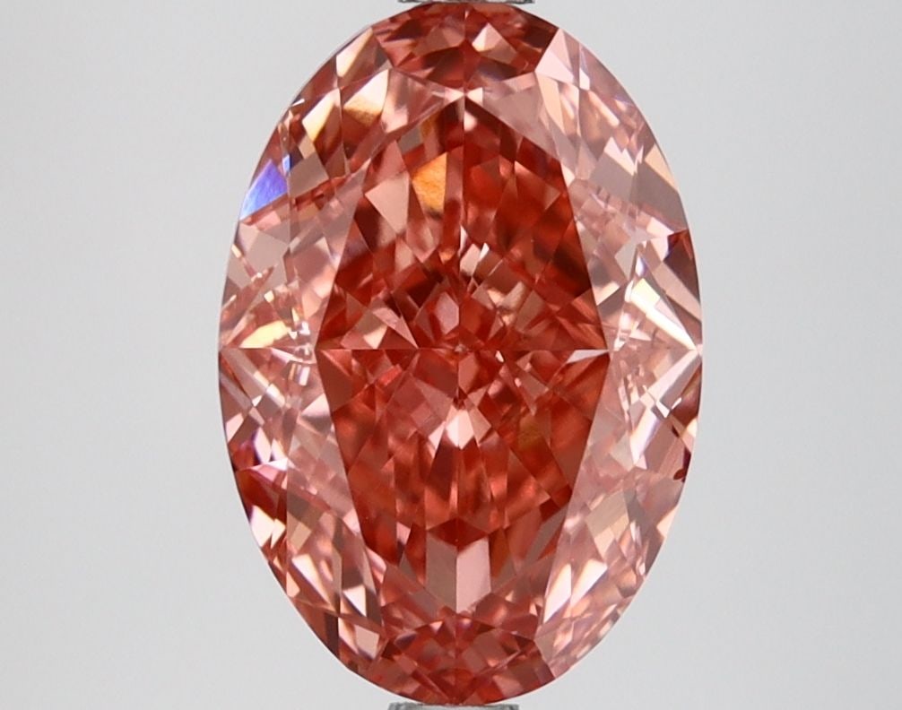 Loose Lab Diamond IGI Oval 3.1ct Fancy Vivid Pink VS1: Loose Lab Diamond IGI Oval 3.1ct Fancy Vivid Pink VS1 Loose Lab Diamond IGI Oval 3.1ct Fancy Vivid Pink VS1, certified by IGI, with excellent polish and symmetry, measuring 10.89L x 7.42W x 4.9H. Item