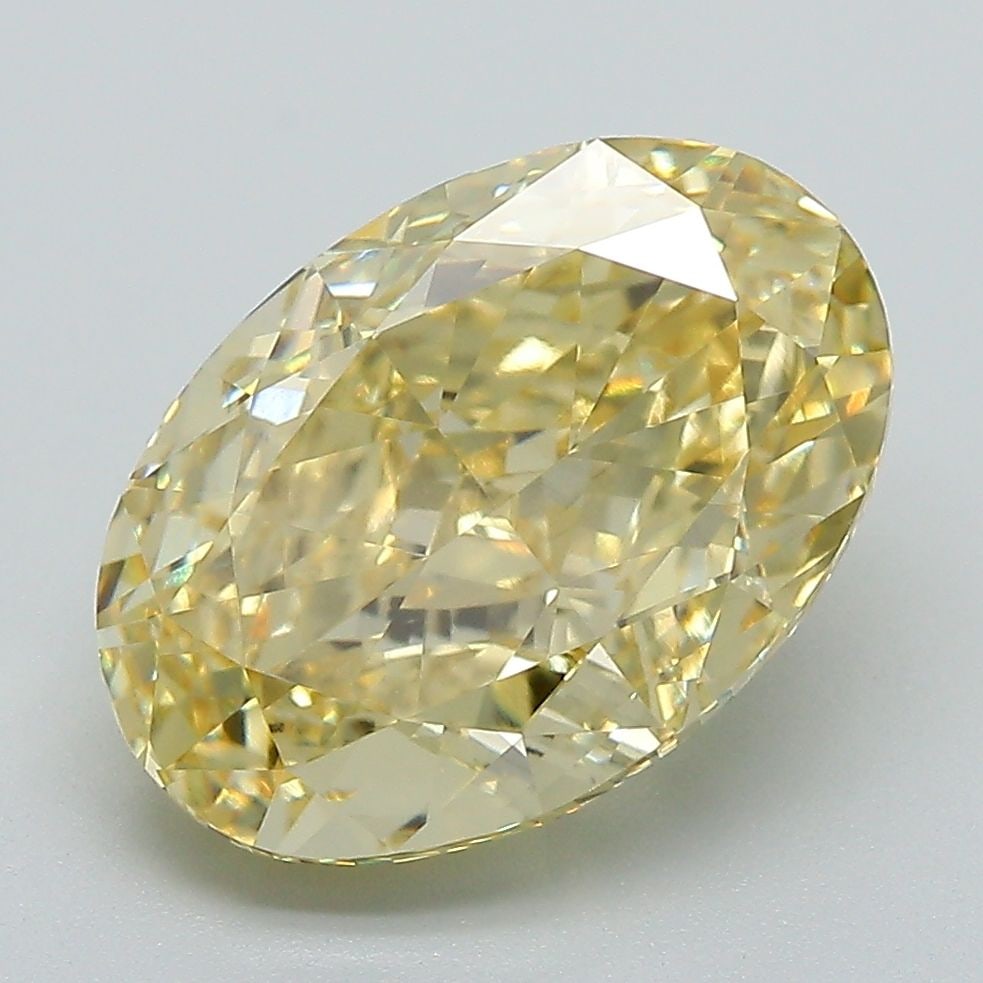 Loose Lab Diamond IGI Oval 4.74ct Fancy Vivid Yellow VS1: Loose Lab Diamond IGI Oval 4.74ct Fancy Vivid Yellow VS1 Loose Lab Diamond IGI Oval 4.74ct Fancy Vivid Yellow VS1, certified by IGI, with excellent polish and symmetry, measuring 12.34L x 8.45W x 5.63