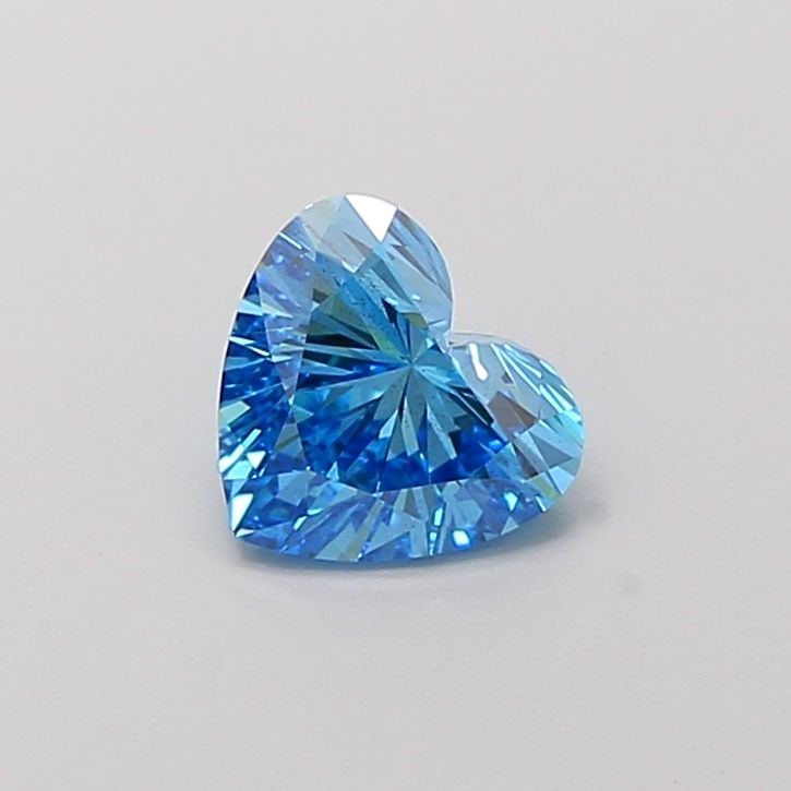 Loose Lab Diamond IGI Heart 1.01ct Fancy Vivid Blue VS2: Loose Lab Diamond IGI Heart 1.01ct Fancy Vivid Blue VS2 This 1.01ct heart loose lab diamond features a Fancy Vivid Blue color and VS2 clarity, certified by IGI, with excellent polish and symmetry. Ite