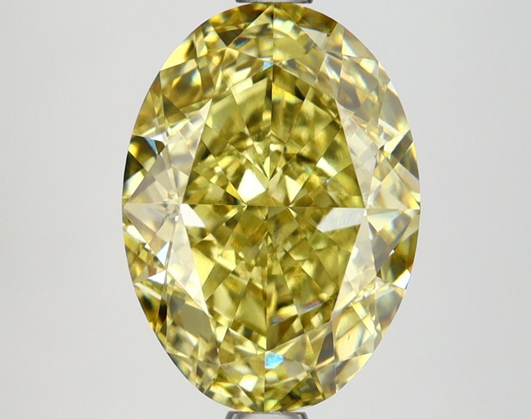 Loose Lab Diamond IGI Oval 3.53ct Fancy Intense Yellow VS1: Loose Lab Diamond IGI Oval 3.53ct Fancy Intense Yellow VS1 Loose lab-grown diamond weighing 3.53ct, featuring a fancy intense yellow color and VS1 clarity, certified by IGI. It has excellent polish an