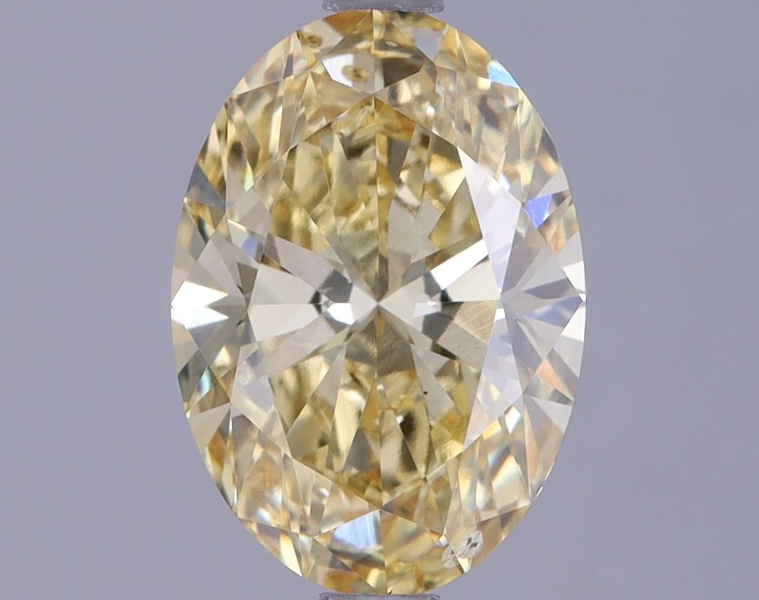 Loose Lab Diamond IGI Oval 2.05ct Fancy Intense Yellow VS2: Loose Lab Diamond IGI Oval 2.05ct Fancy Intense Yellow VS2 Loose Lab Diamond IGI Oval, 2.05ct in Fancy Intense Yellow, clarity VS2, IGI certified, featuring excellent polish and symmetry. Item Specifi