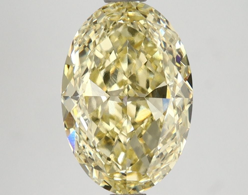 Loose Lab Diamond IGI Oval 2.76ct Fancy Intense Yellow VVS2: Loose Lab Diamond IGI Oval 2.76ct Fancy Intense Yellow VVS2 Loose Lab Diamond IGI Oval 2.76ct Fancy Intense Yellow VVS2, exhibiting EX polish and symmetry, measuring 10.69L X 7.2W X 4.49H, certified b