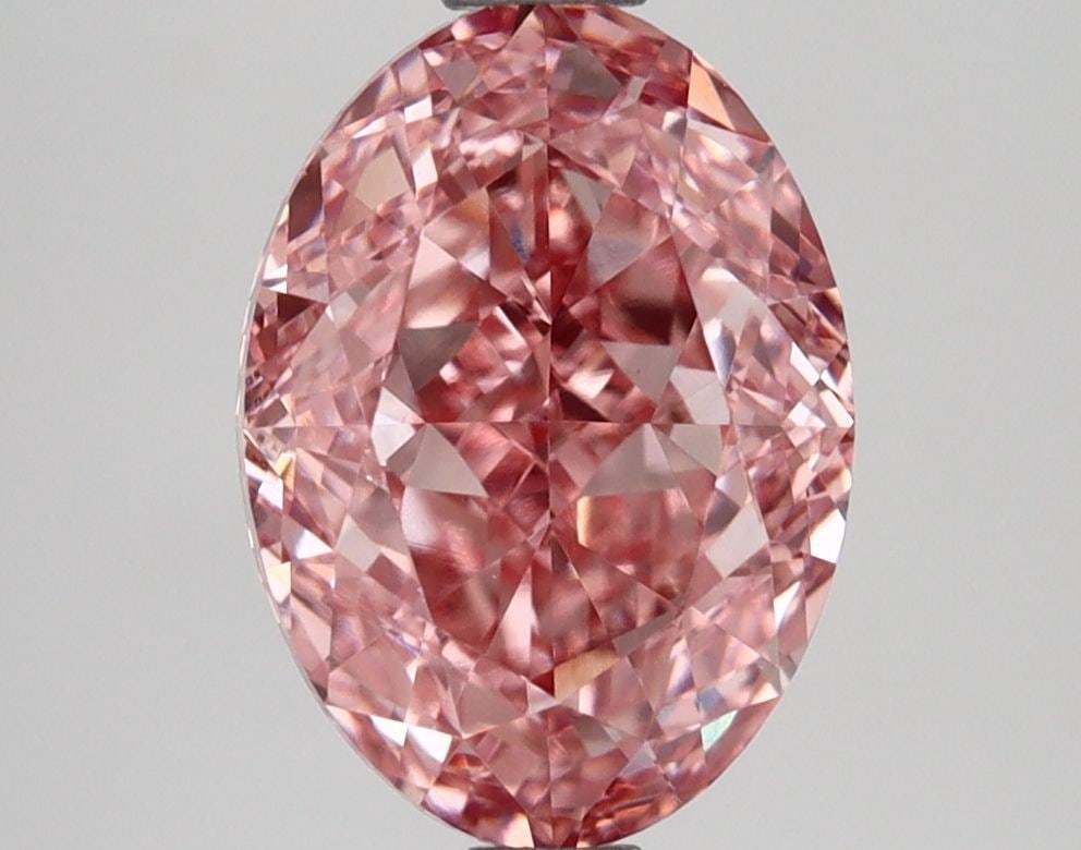 Loose Lab Diamond IGI Oval 2.53ct Fancy Vivid Pink VVS2: Loose Lab Diamond IGI Oval 2.53ct Fancy Vivid Pink VVS2 Loose lab-grown diamond weighing 2.53ct, oval cut with fancy vivid pink color and clarity VVS2, certified by IGI, featuring excellent polish and
