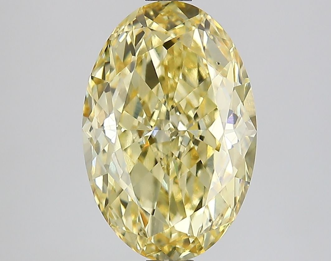 Loose Lab Diamond IGI Oval 2.74ct Fancy Intense Yellow VS2: Loose Lab Diamond IGI Oval 2.74ct Fancy Intense Yellow VS2 Loose Lab Diamond IGI Oval 2.74ct Fancy Intense Yellow VS2 with good polish and symmetry; measures 11.55L x 7.73W x 4.31H and is certified by