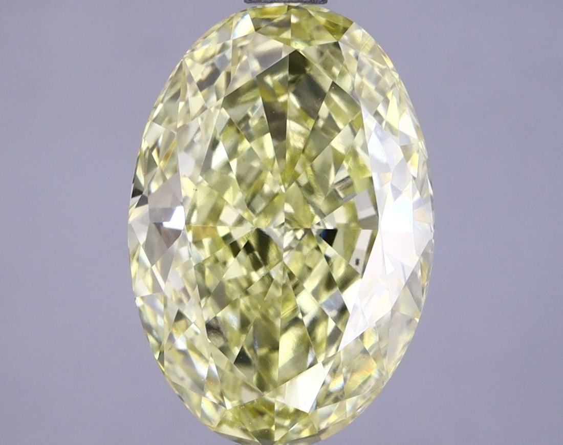 Loose Lab Diamond 2.74ct Fancy Vivid Yellow VS1 IGI Oval: Loose Lab Diamond 2.74ct Fancy Vivid Yellow VS1 IGI Oval Loose Lab Diamond weighing 2.74ct, oval cut, with Fancy Vivid Yellow color and clarity VS1, certified by IGI. Dimensions measure 11.24L x 7.71W