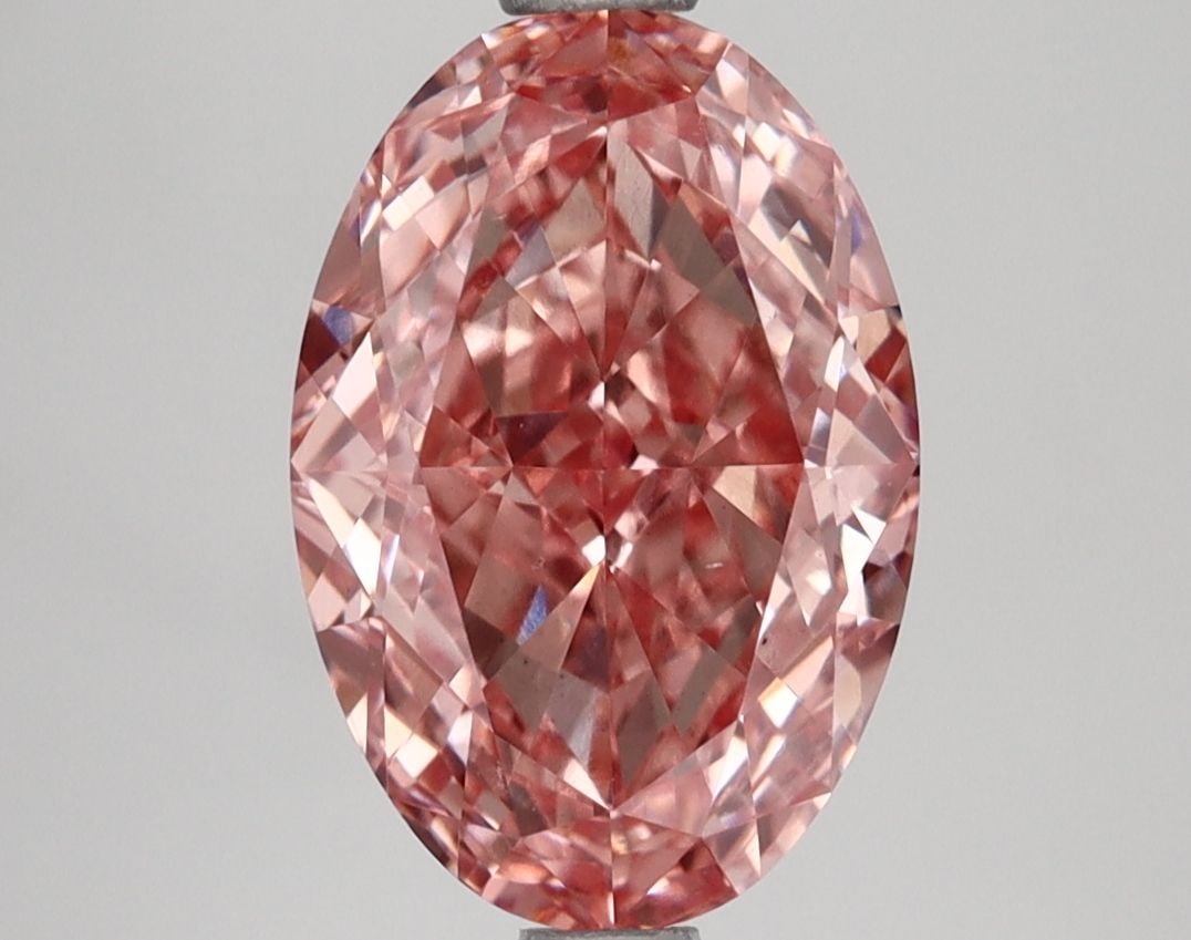 Loose Lab Diamond IGI Oval 2.52ct Fancy Vivid Pink VS1: Loose Lab Diamond IGI Oval 2.52ct Fancy Vivid Pink VS1 Loose Lab Diamond weighing 2.52ct, oval cut, with Fancy Vivid Pink color and clarity VS1, certified by IGI. Dimensions measure 10.45L x 7.11W x 4